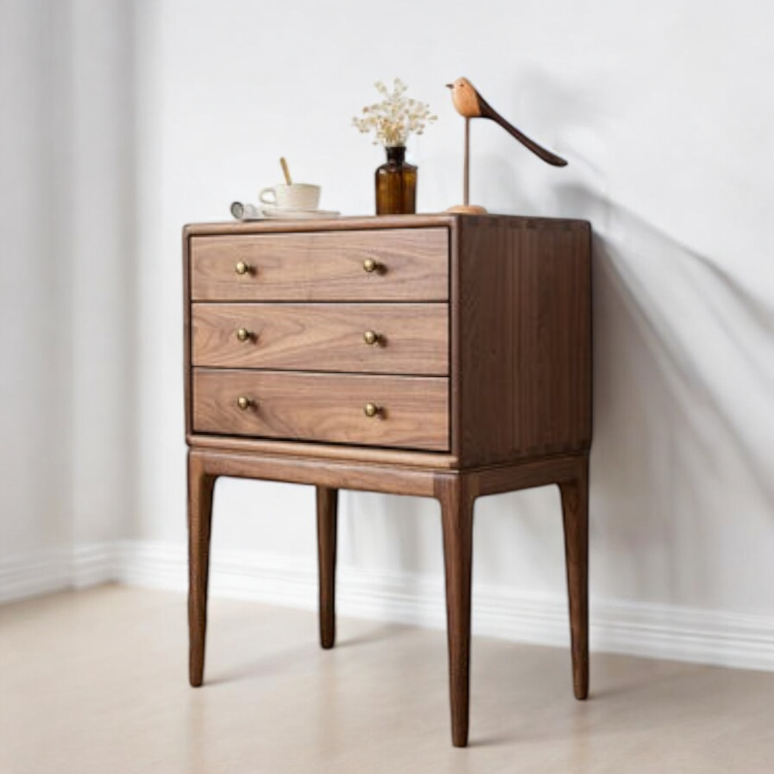 Small cabinet with sleek design for efficient storage in any room.
