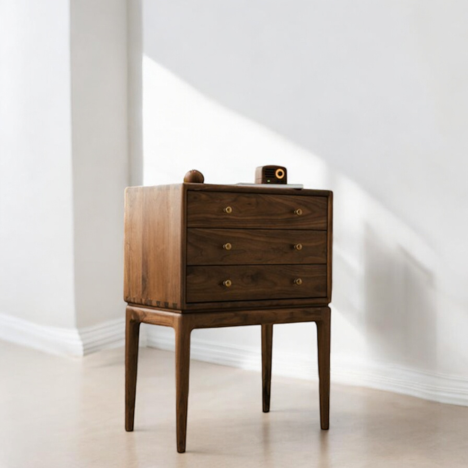 Elegant chest of drawer in classic wood finish, perfect for bedroom storage.
