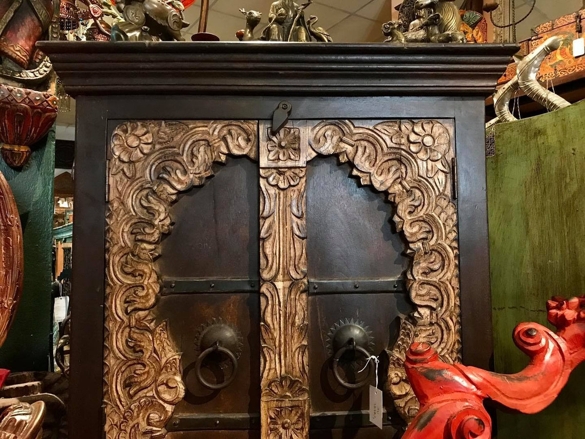 Cabinet with carved doors