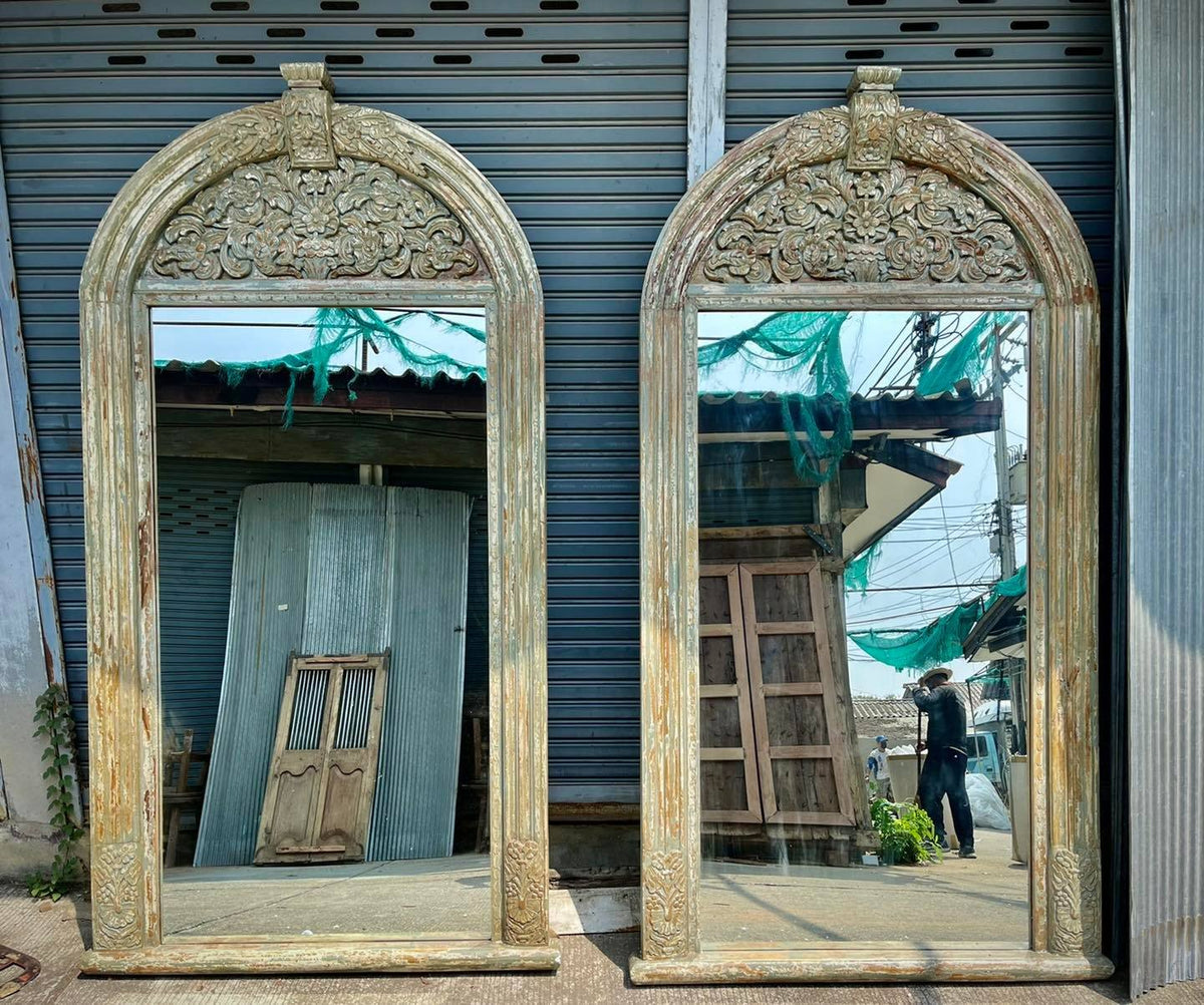 Carved arch mirror