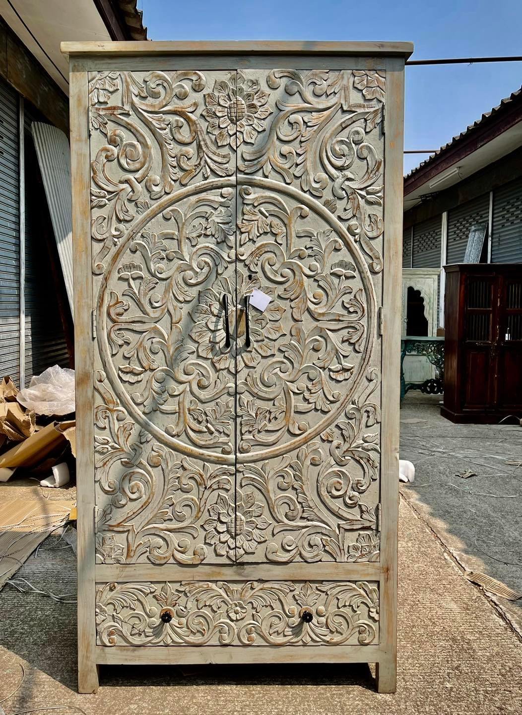 Carved door cabinet