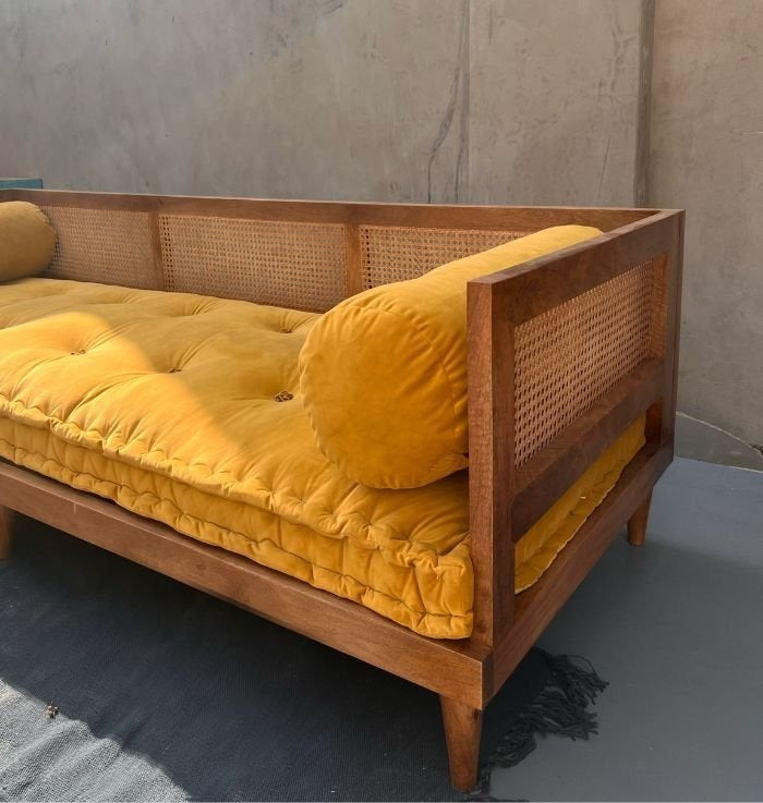 Aesthetic Cane Daybed Sofa | Handcrafted Mango Wood Lounger with Yellow Cushion & Bolsters | Bohemian Living Room Furniture | RIVO HOMES