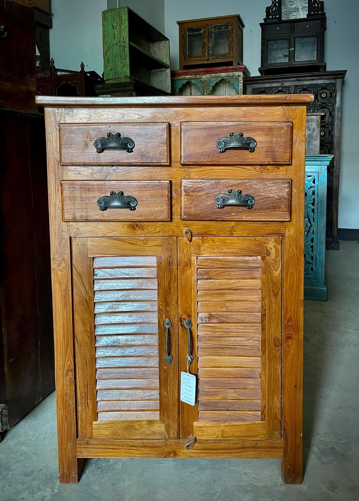 Louvered door cabinet