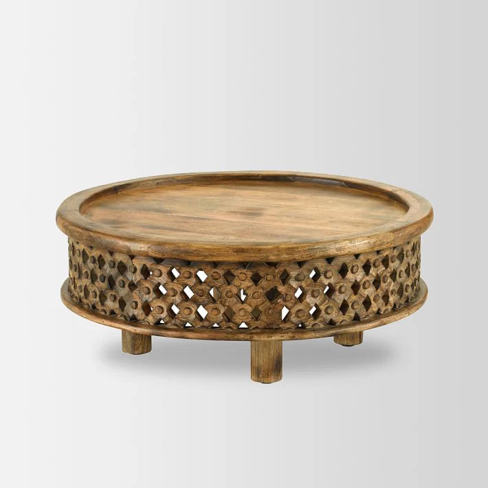 Round carved center table
