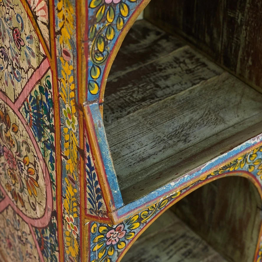 Decorative wooden chair with colorful floral patterns