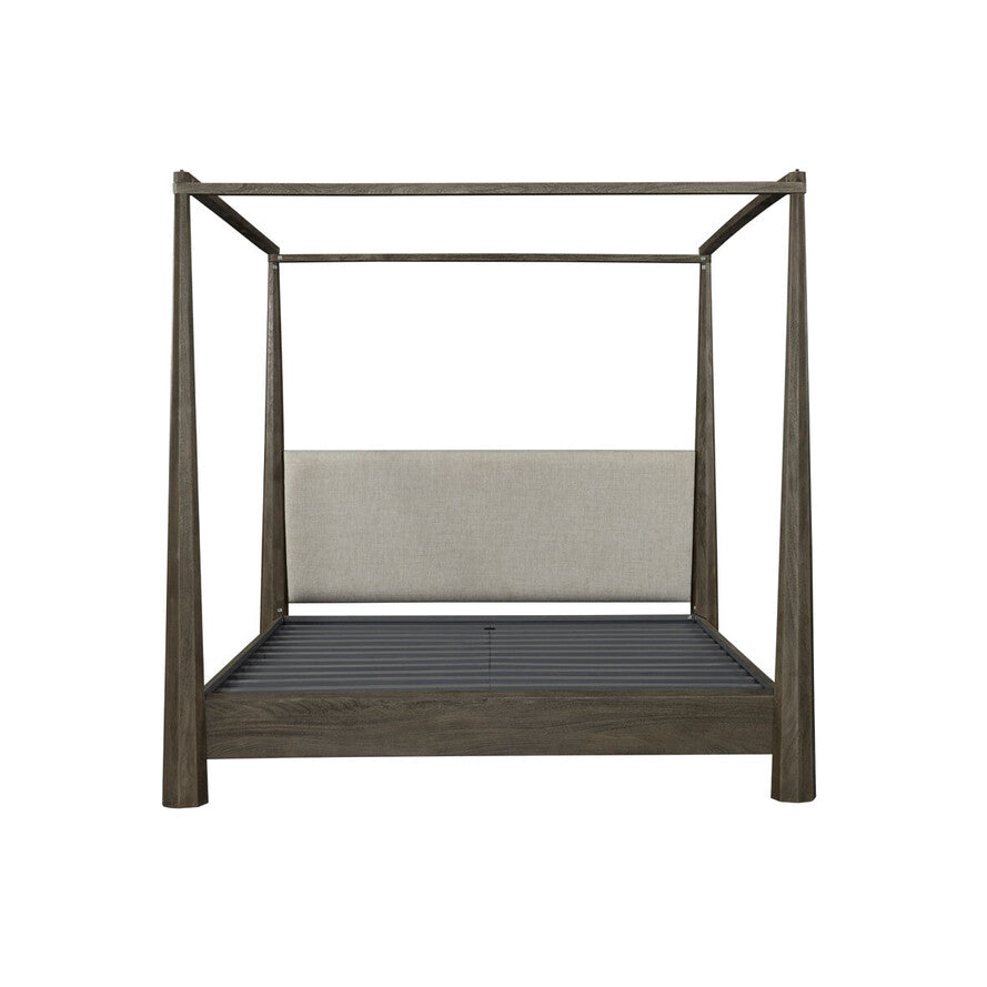 Wooden canopy bed with gray cushion on a white background
