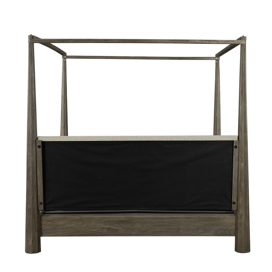 Wooden canopy bed frame with a black fabric panel on a white background