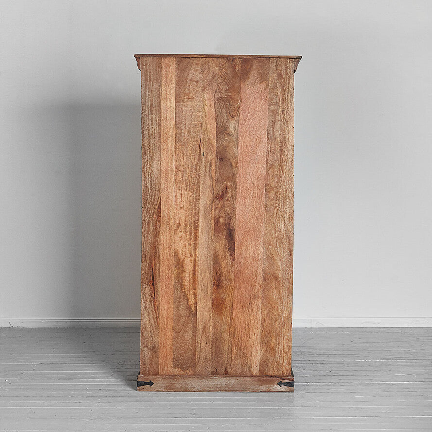Wooden cabinet with a rustic finish on a gray floor and background