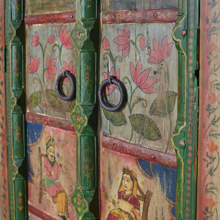 Decorative wooden door with floral patterns and painted figures