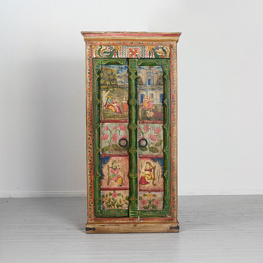 Decorative wooden cabinet with painted panels on a white background