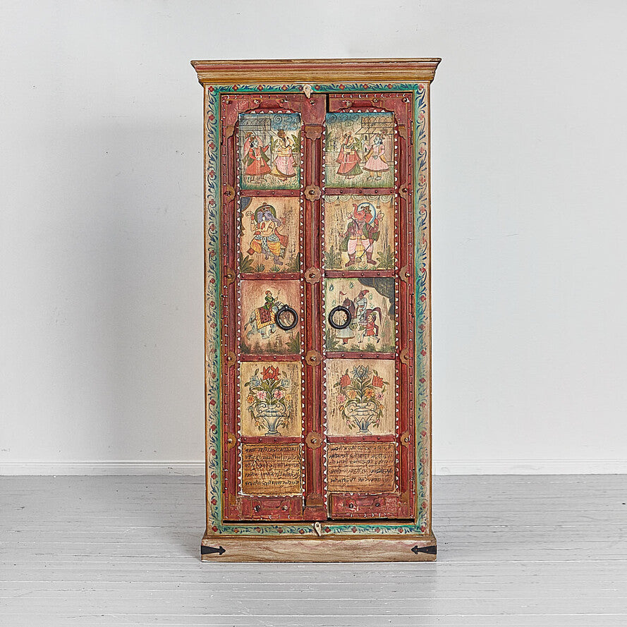 Decorative wooden cabinet with painted designs on a white background