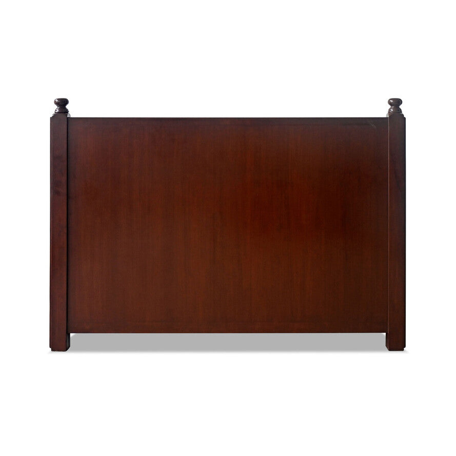 Wooden headboard with decorative finials on a white background