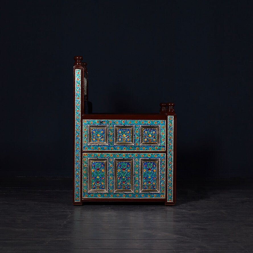 Side profile of a handcrafted Jodhpur throne chair showing intricate metal cladding details.
