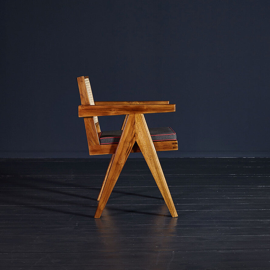 Wooden chair with a dark background