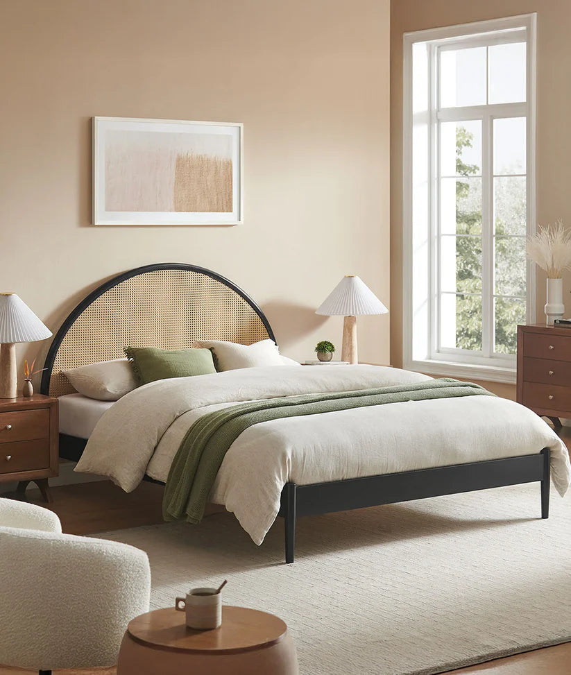 arched rattan bed