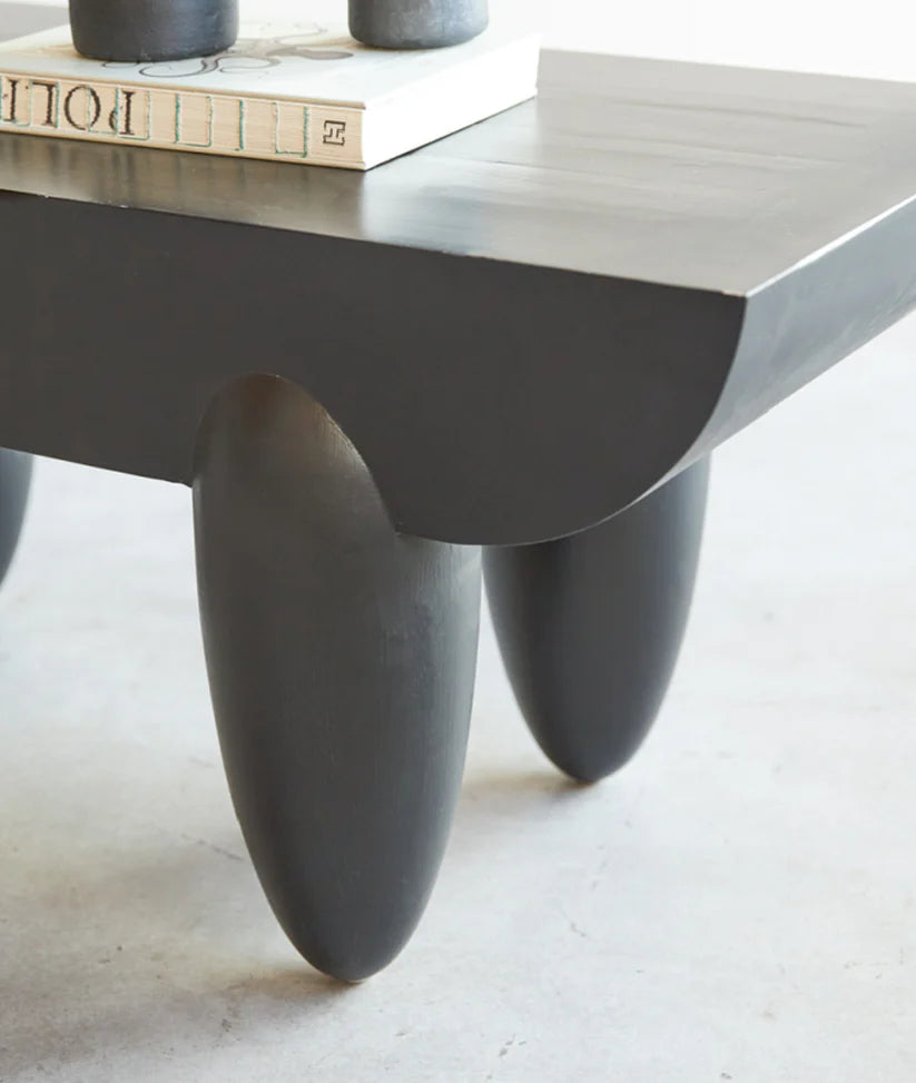 bold walnut finish statement table