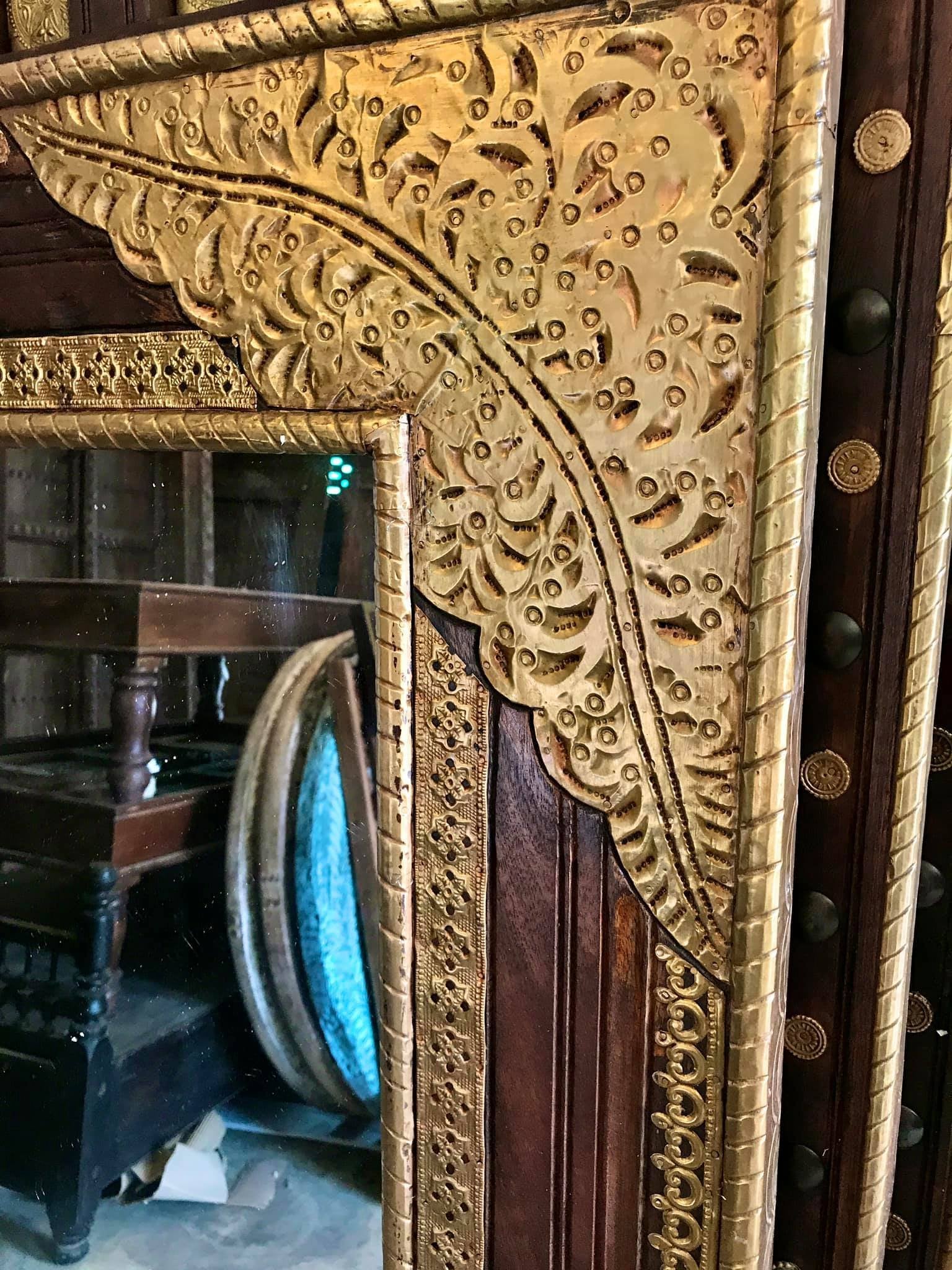brass and wood mirror