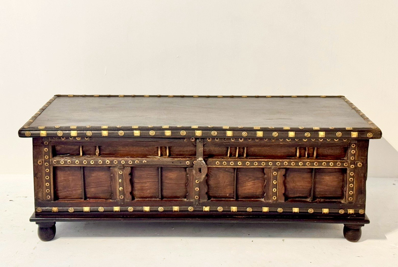 brass wood trunk