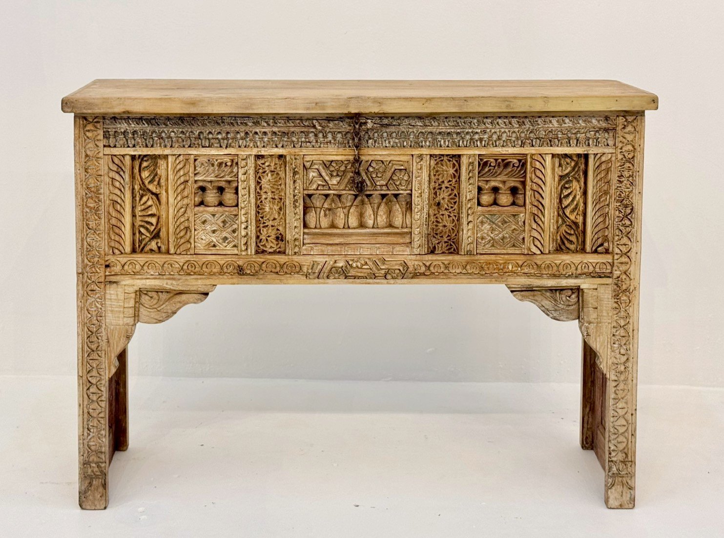 carved console table
