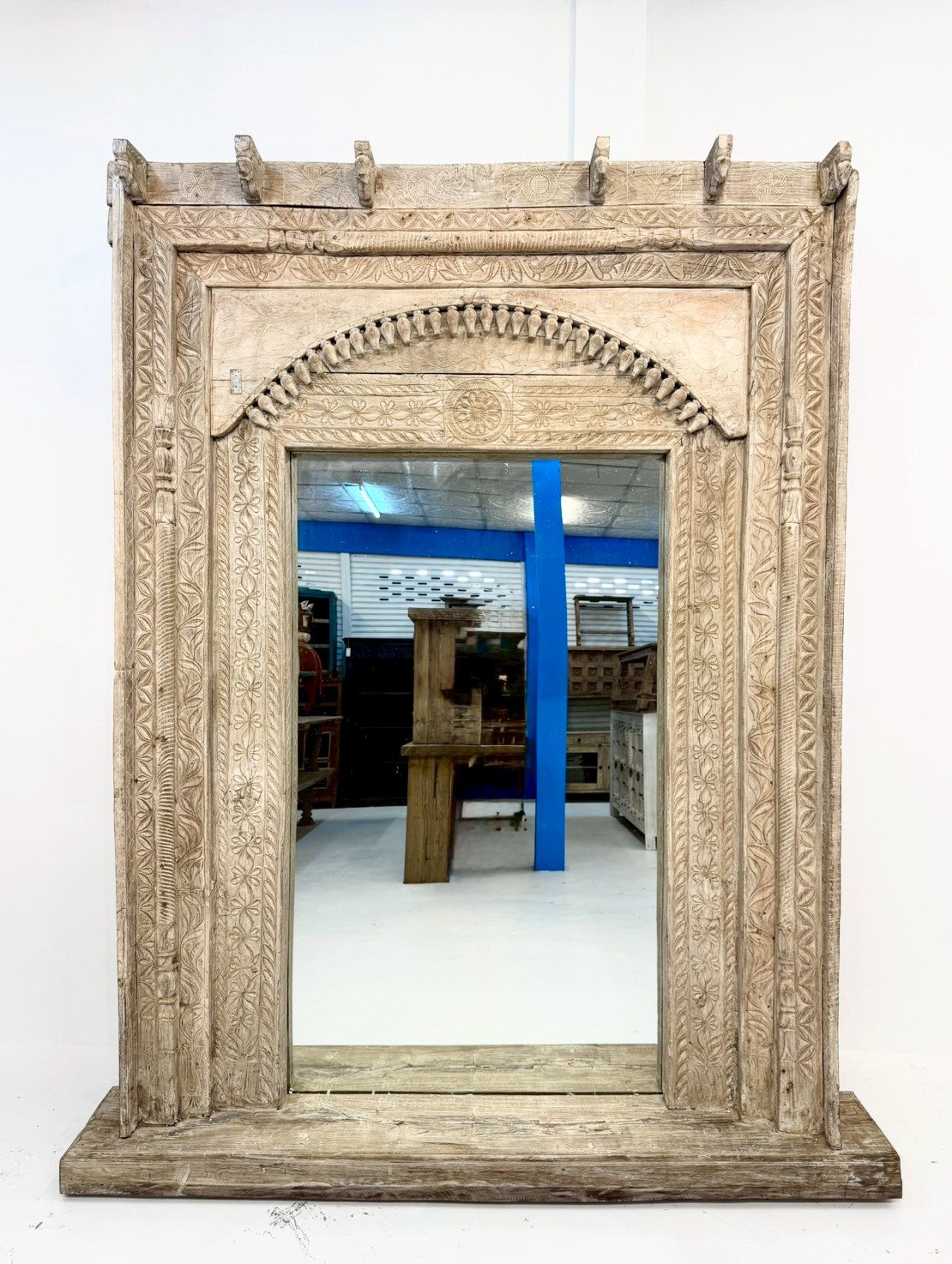carved frame mirror