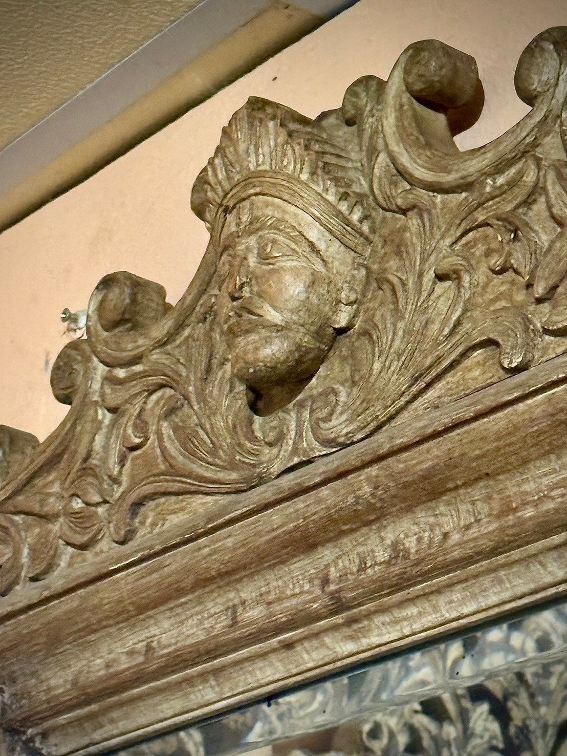 carved wall mirror