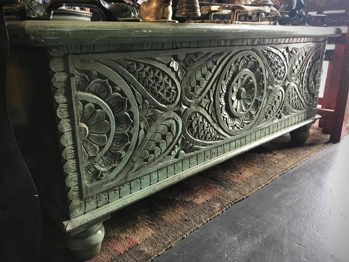 carved wooden blanket trunk
