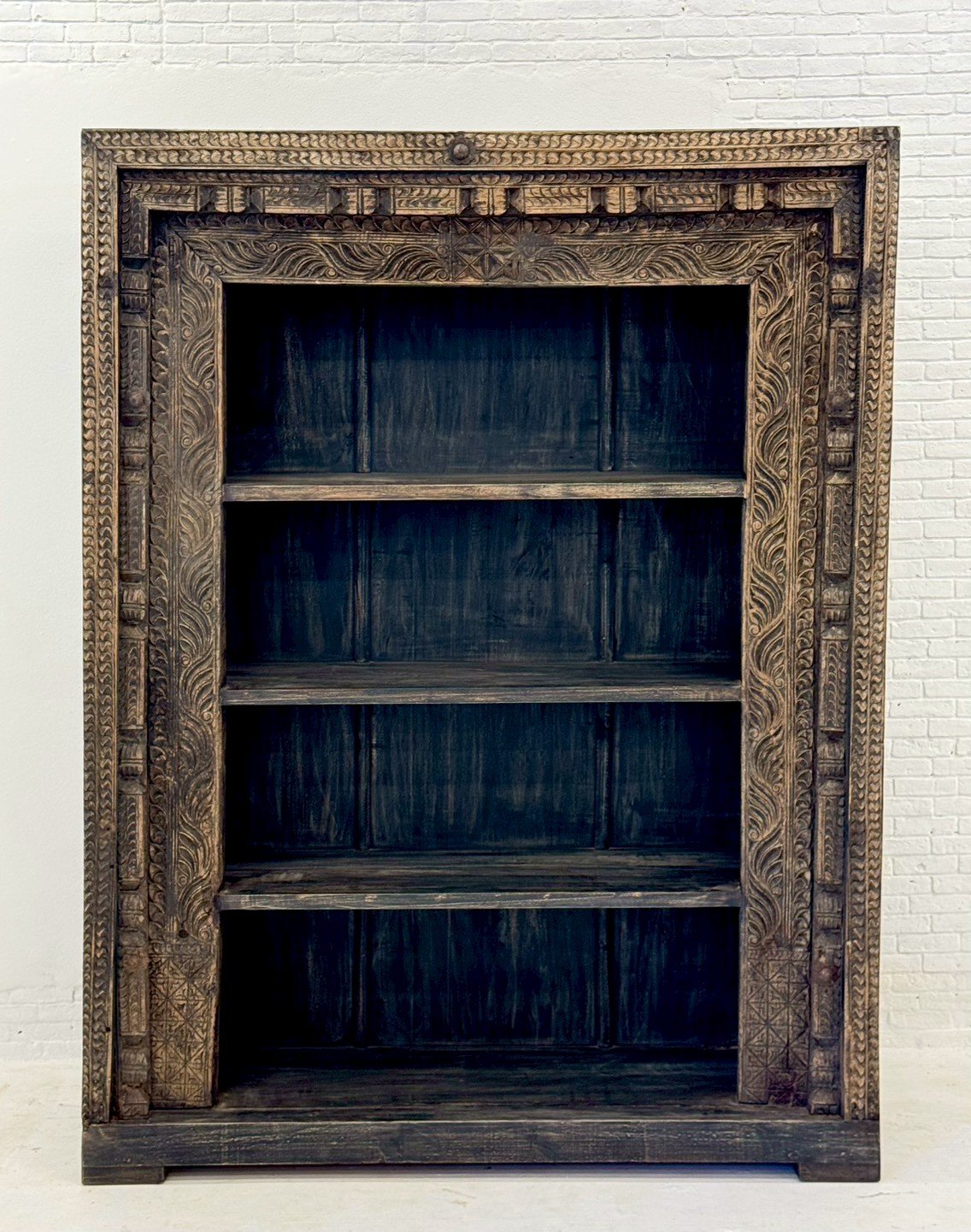 carved wooden shelf