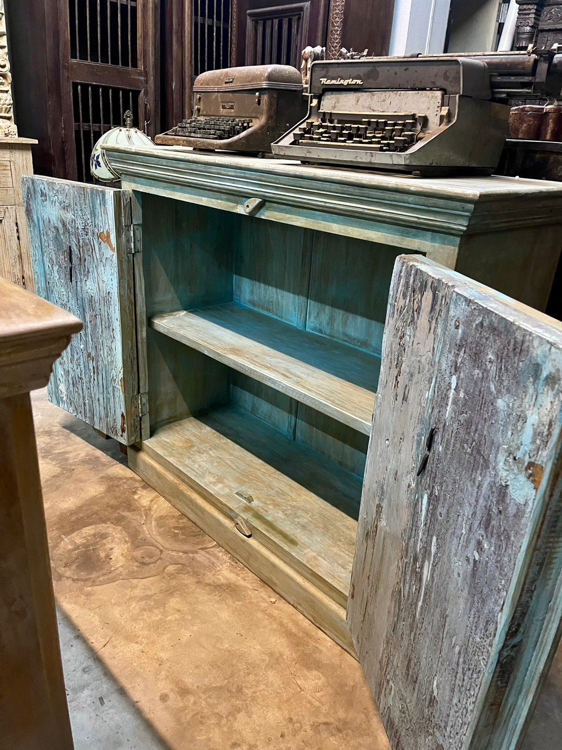 distressed blue cabinet