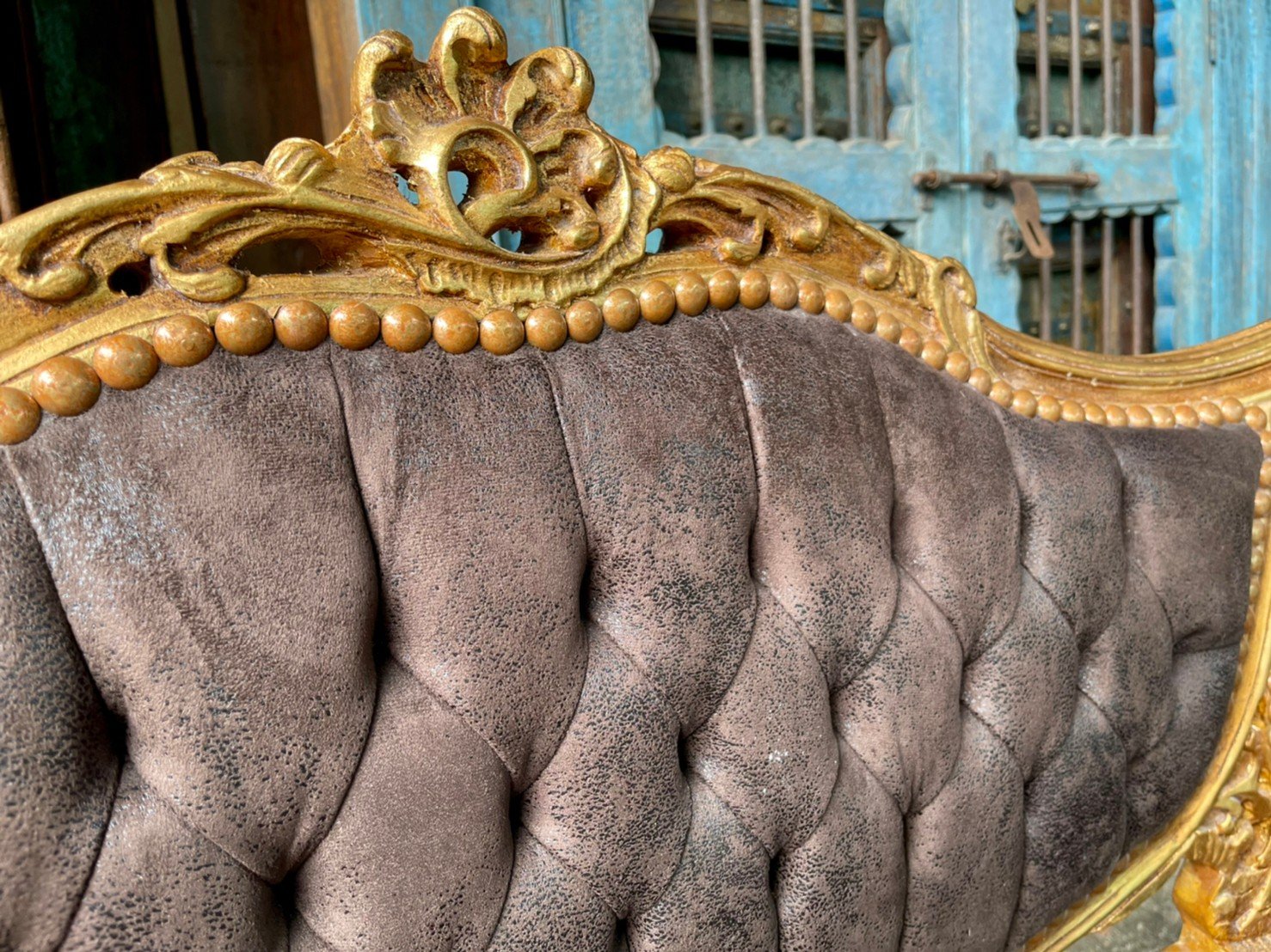 distressed gold sofa