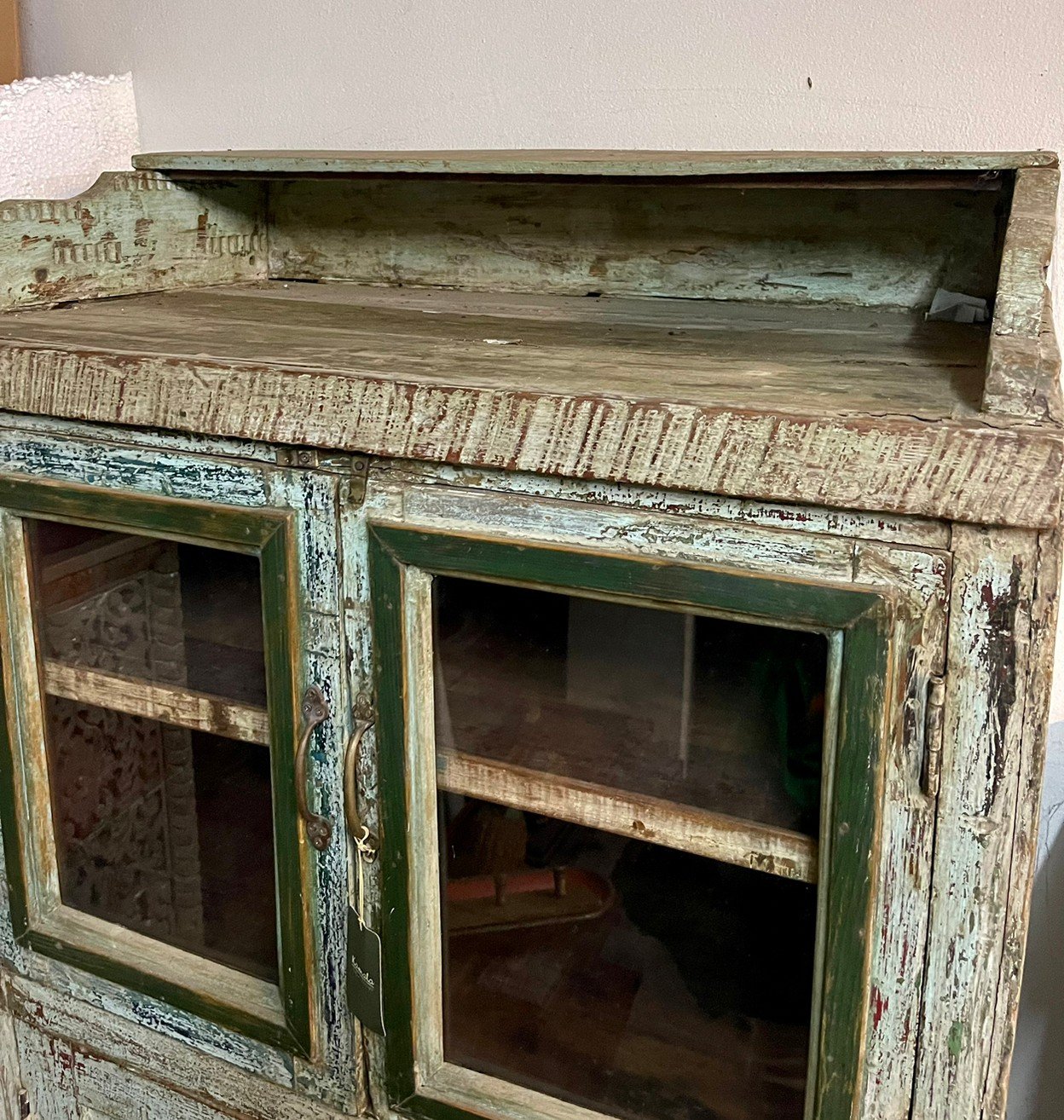 distressed green cabinet