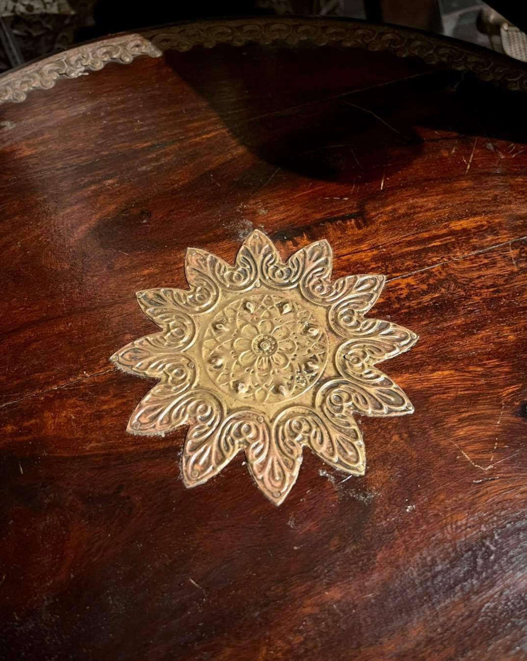 embossed brass accent table