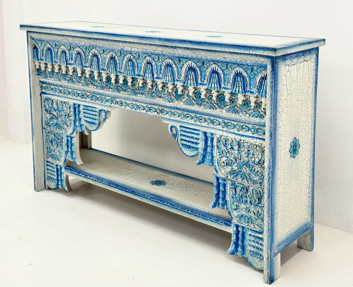 Hail Console Table – Vibrant Teal-Blue Distressed Finish, Intricately Carved Apron with Arches & Openwork, Tapered Legs, Low-Set Open Shelf, Mango Wood, Painted Finish (150 × 38 × 90 cm) - RIVO HOMES