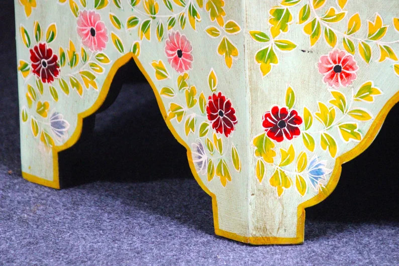 hand painted coffee table, mango wood coffee table, octagonal coffee table, floral coffee table, painted wood table, colorful coffee table, bohemian table, indian furniture, living room table, statement coffee table, handmade coffee table, artisan made table, premium wood table, quality furniture, durable table, sturdy table, timeless table, elegant table, ornate table, unique table, artistic table, focal piece table, handcrafted in india, sustainable mango wood, hand painted finish, floral botanical motifs