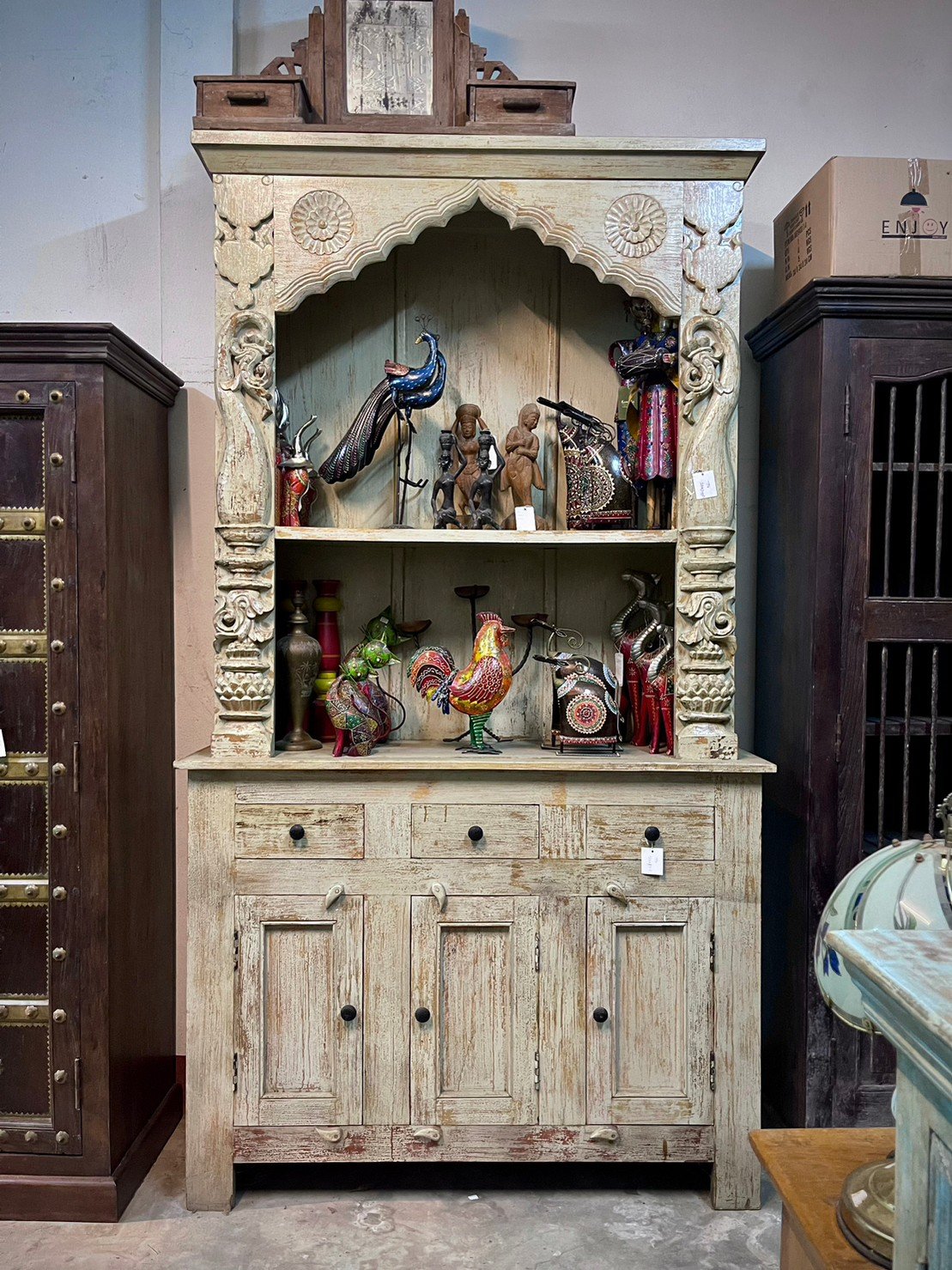 open cabinet with drawers