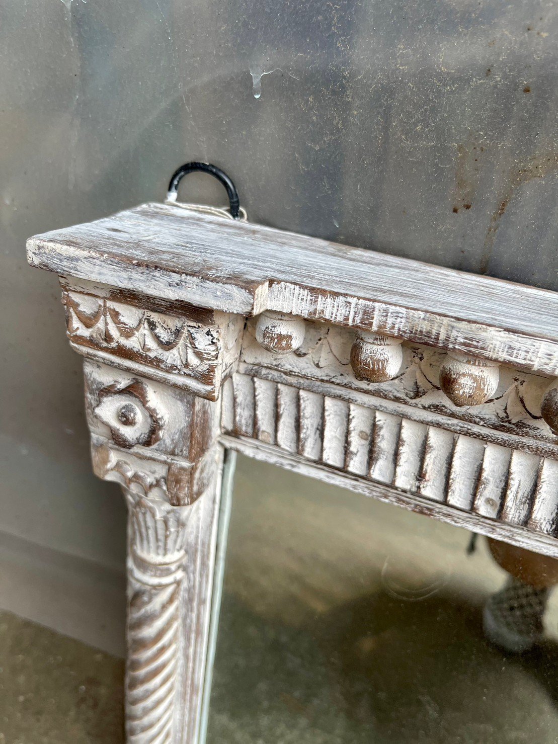 spiraled pillar mirror
