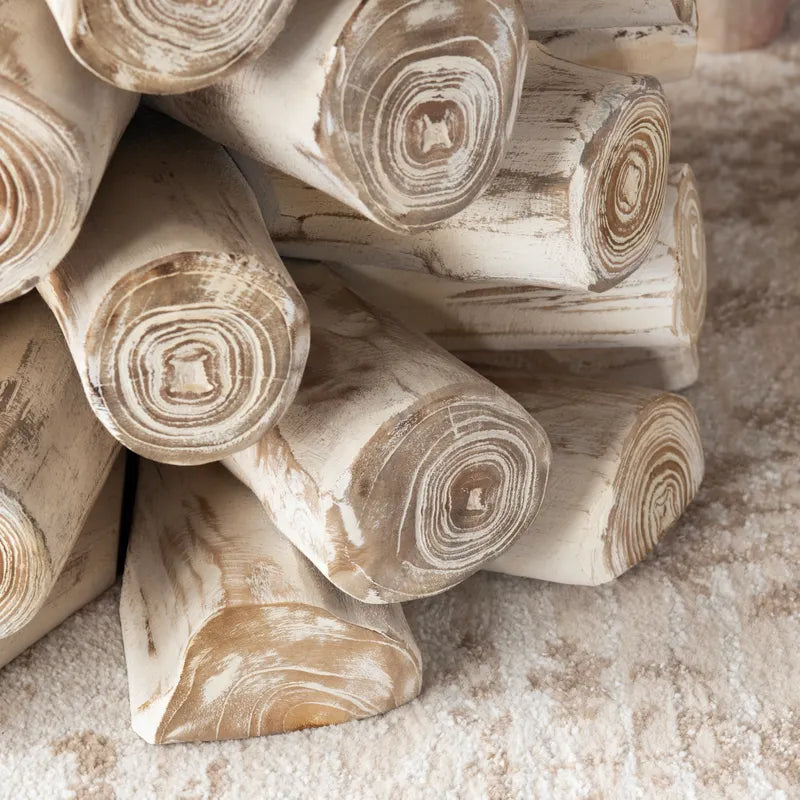 stacked mango wood logs