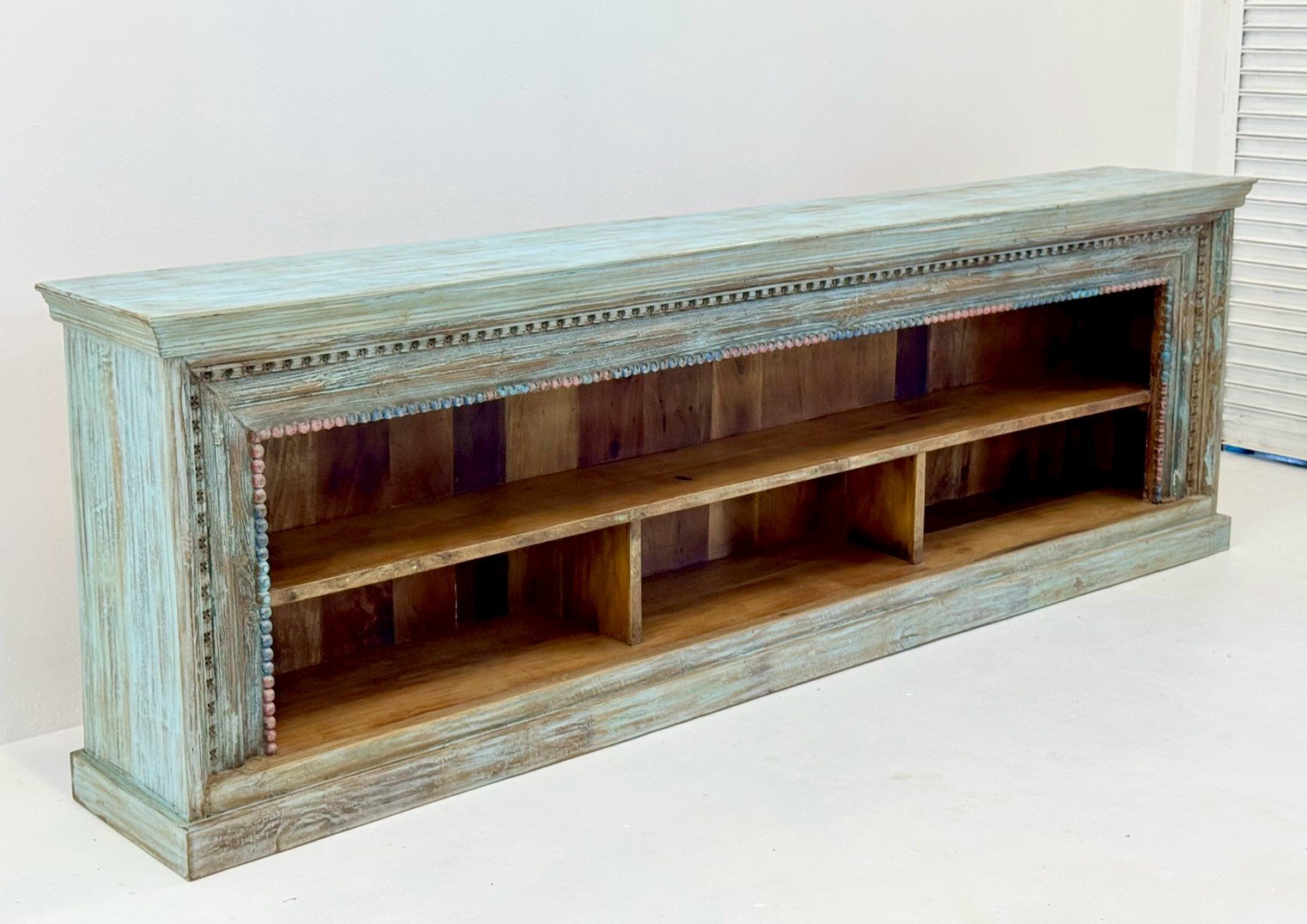 Supine Long Display Shelf – 295 cm hand-carved sideboard with distressed teal finish, open cubby shelving, moulding frame. - RIVO HOMES