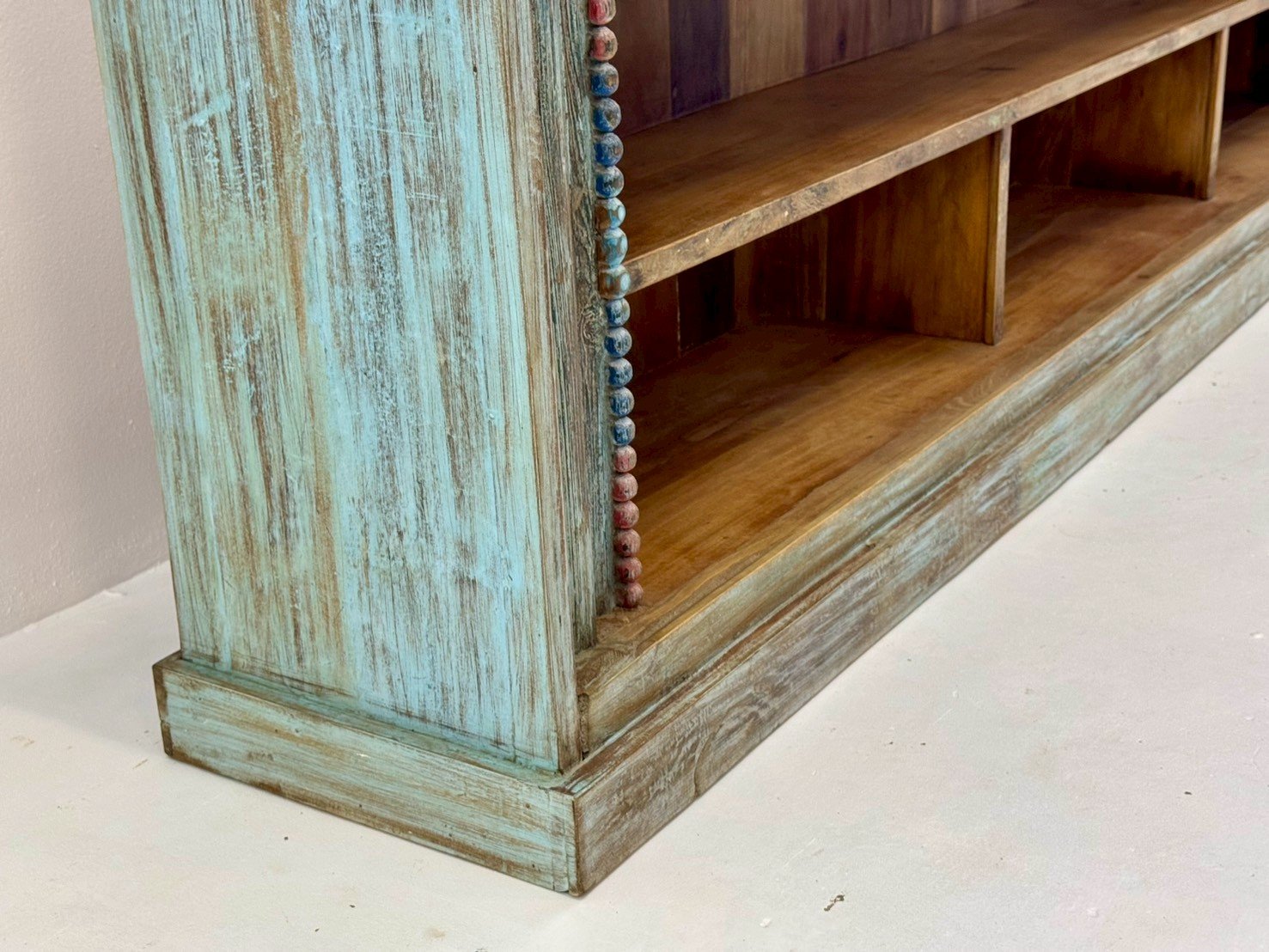 Supine Long Display Shelf – 295 cm hand-carved sideboard with distressed teal finish, open cubby shelving, moulding frame. - RIVO HOMES