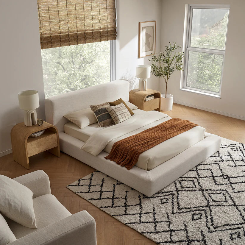 winged upholstered bed